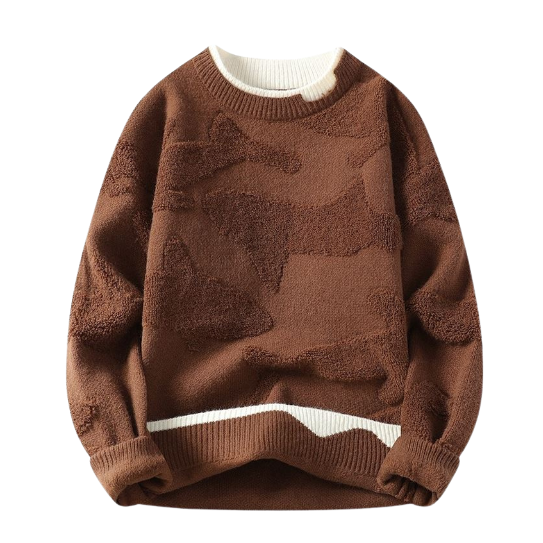 Pull avec motif texturé dans un style abstrait